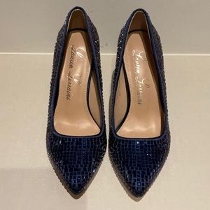 Navy all over jeweled pump. Gently worn